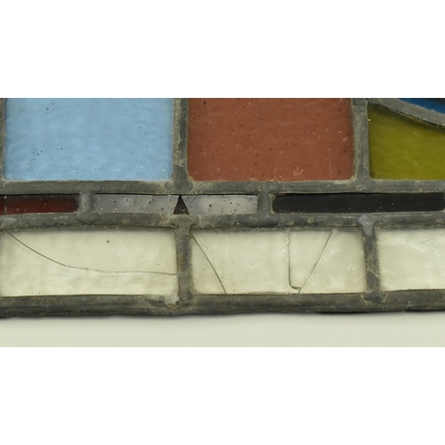 428 - A 19th century Victorian stained glass window feature panel, brightly coloured. The stained glass fr... 