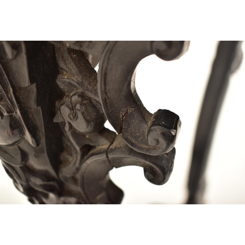 431 - A 19th century Chinese Oriental ebonised carved hardwood plant stand / jardiniere / vase stand. The ... 