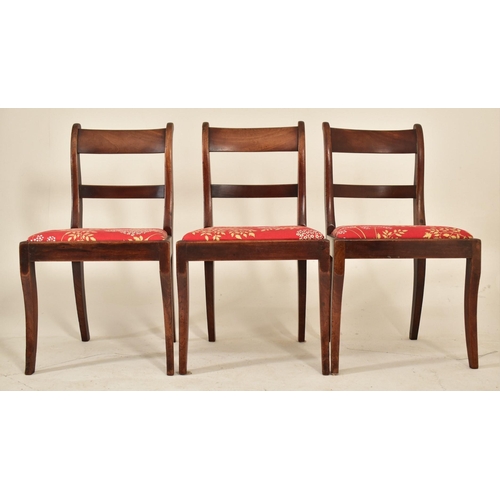 433 - A set of six Regency George IV early 19th century mahogany sabre leg dining chairs. Each chair havin... 