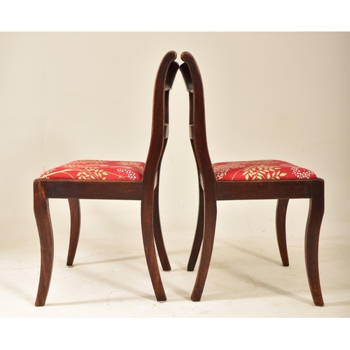 433 - A set of six Regency George IV early 19th century mahogany sabre leg dining chairs. Each chair havin... 