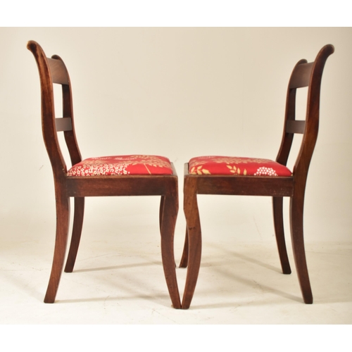 433 - A set of six Regency George IV early 19th century mahogany sabre leg dining chairs. Each chair havin... 