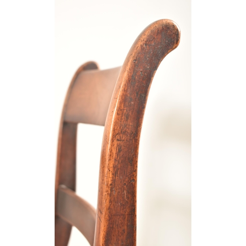 433 - A set of six Regency George IV early 19th century mahogany sabre leg dining chairs. Each chair havin... 