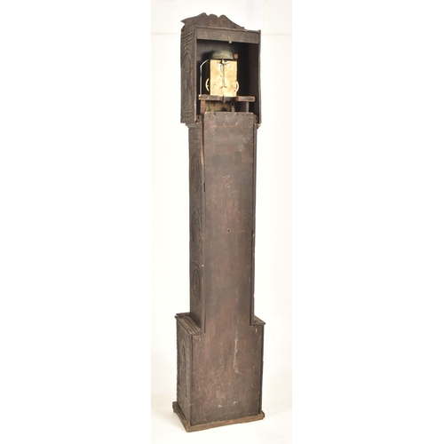 435 - A Dutch Flemish 19th century ebonised carved oak 8-day movement longcase clock. The clock having bra... 