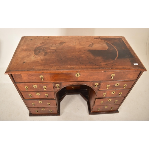 440 - An 18th Century Queen Anne inlaid walnut secretaire desk. The secretaire having a hinged top and fal... 