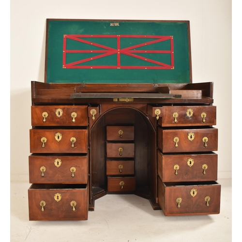 440 - An 18th Century Queen Anne inlaid walnut secretaire desk. The secretaire having a hinged top and fal... 