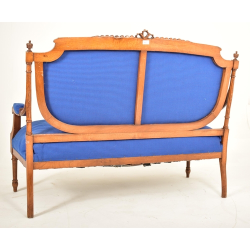 443 - A French Louis XVI style 20th century carved oak & upholstered two seater canape sofa. The sofa havi... 