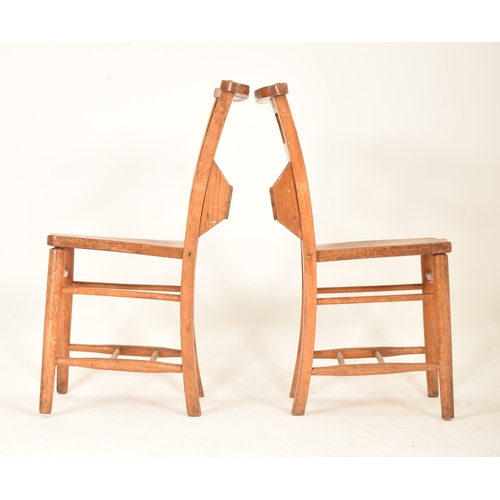 445 - A set of twelve Victorian 19th century beech and elm wood chapel / church inspired chairs. Each chai... 