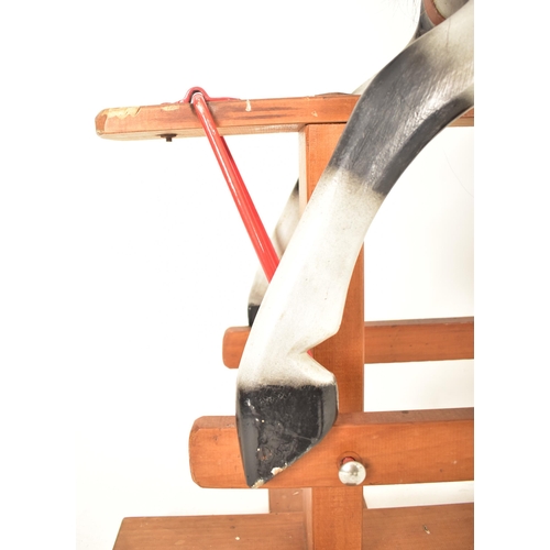 451 - An early 20th century circa 1920s hand painted rocking horse in the manner of Line Bros. The horse w... 