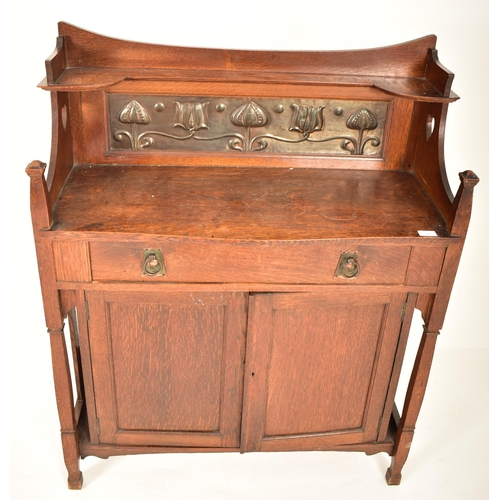 456 - Manner of Shapland & Petter - An Arts & Crafts late 19th century oak & embossed metal sideboard cred... 