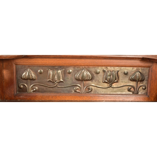 456 - Manner of Shapland & Petter - An Arts & Crafts late 19th century oak & embossed metal sideboard cred... 