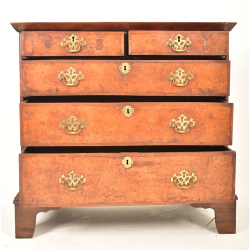 472 - An early 18th century Queen Anne burr walnut chest of drawers. The chest of drawers featuring two sm... 