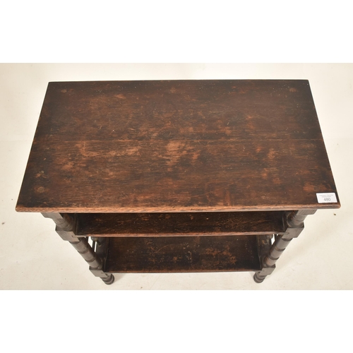 480 - Leonard Wyburd (1865-1958) x Liberty & Co - An Arts & Crafts oak wood three-tier book / side table. ... 