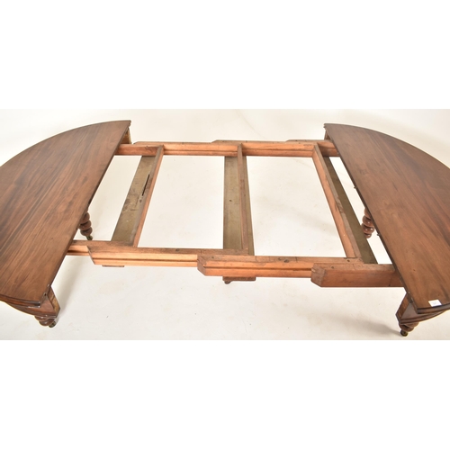 307 - A large Victorian 19th century mahogany bobbin leg round extending dining table. The table having a ... 