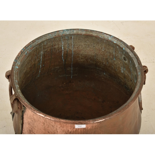 308 - A large 19th century Victorian copper cauldron pot / planter. The pot of large globular form with wr... 