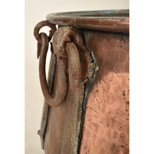 308 - A large 19th century Victorian copper cauldron pot / planter. The pot of large globular form with wr... 