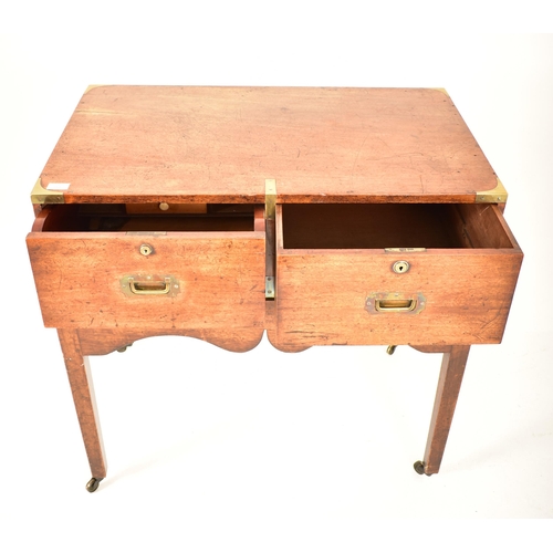 310 - A George III early 19th century mahogany campaign chest of drawers on stand. The chest having brass ... 