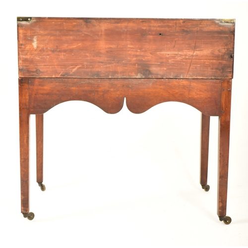 310 - A George III early 19th century mahogany campaign chest of drawers on stand. The chest having brass ... 