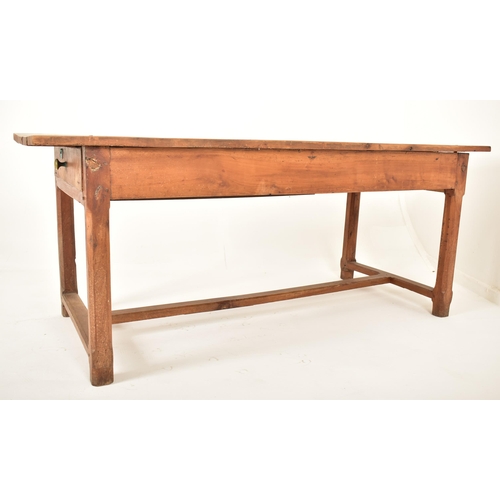 315 - A 19th century French continental chestnut wood refectory farmhouse dining table. The table having a... 