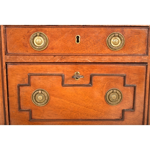 320 - A George III early 19th century mahogany drop leaf ladies work table. The table having a squared top... 