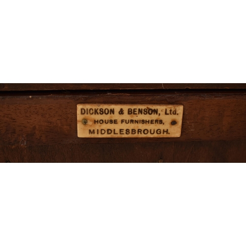 332 - An Edwardian mahogany astragal glazed library bookcase cabinet. The bookcase having a flyaway cornic... 