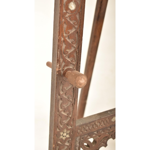 334 - A Moorish late 19th century carved hardwood & mother of pearl inlay artist's easel stand. The easel ... 