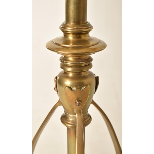 335 - An early 20th century circa 1905 Arts and Crafts style hammered copper and brass standard lamp. The ... 