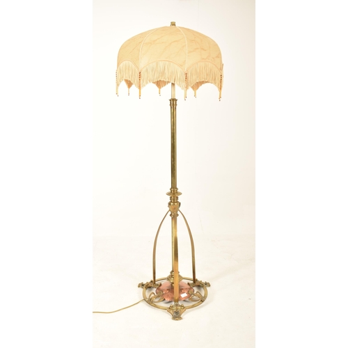 335 - An early 20th century circa 1905 Arts and Crafts style hammered copper and brass standard lamp. The ... 