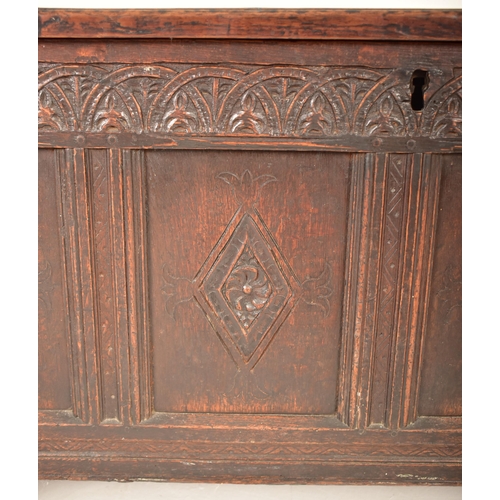 339 - A late 17th century / early 18th century carved oak trunk blanket box chest. The trunk having a stra... 