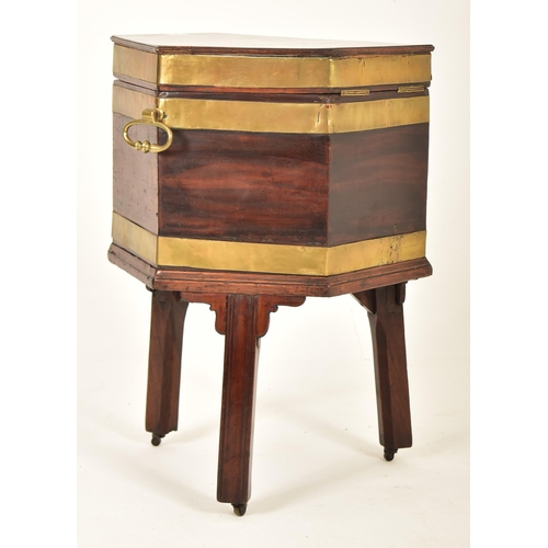 345 - A George III 19th century mahogany & brass bound hexagonal wine cooler on stand. The cooler having a... 