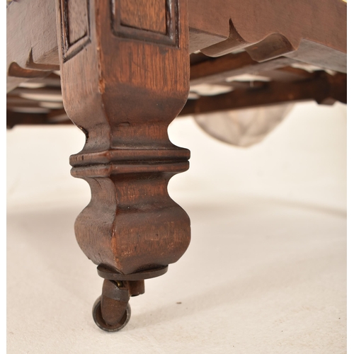 349 - A late 19th century Victorian apprentice mahogany four poster bed with furnishings. The bed with red... 