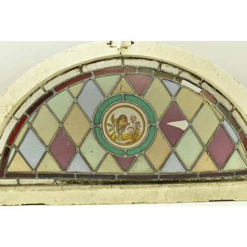 354 - A Victorian 19th century stained glass lead window panel in wooden frame. The panel of half moon for... 