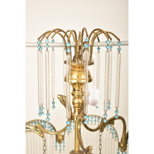 356 - An Art Deco inspired 20th century gilt metal & glass rod ceiling chandelier light. The chandelier ha... 