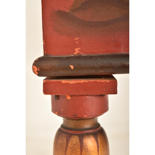 365 - A late 19th century Chinese red lacquered cabinet on stand. The cabinet top having a brass handle wi... 