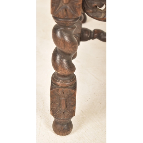 367 - A Carolean 17th century carved walnut & wicker hall chair. The chair having urn shaped finials atop ... 