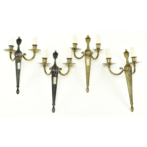 372 - A set of four Italian manner 20th century brass twin arm wall sconces lights. Each sconce having a c... 