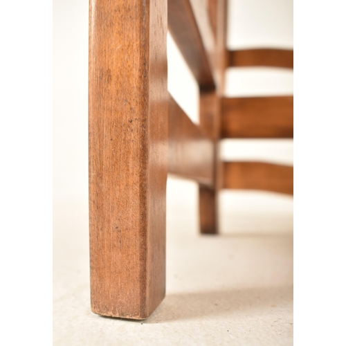 377 - An Edwardian early 20th century beech wood metamorphic set of library steps / chair. The chair havin... 