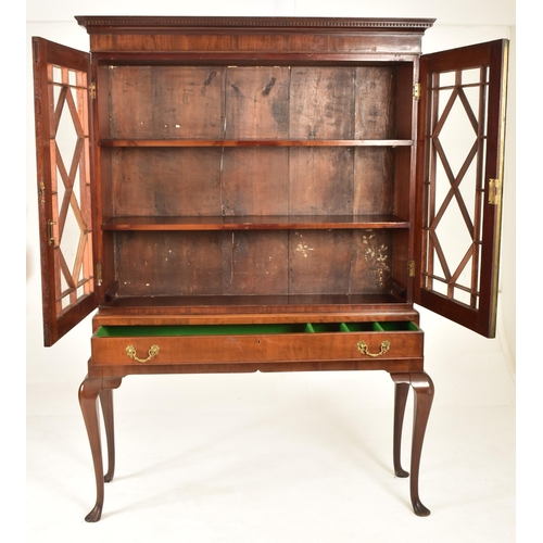 378 - A Victorian 19th century George III revival mahogany cabinet bookcase on stand. The cabinet having a... 