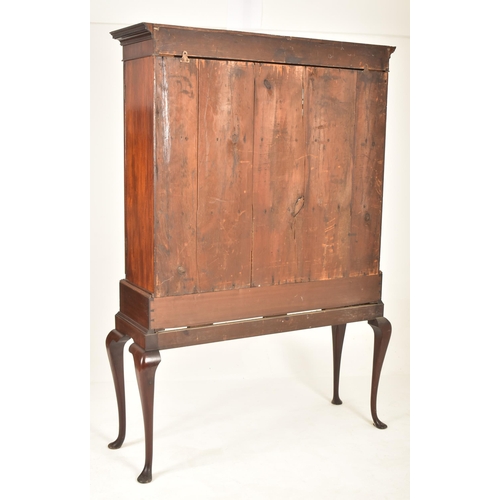 378 - A Victorian 19th century George III revival mahogany cabinet bookcase on stand. The cabinet having a... 