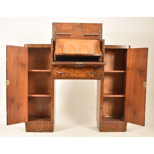 381 - An Art Deco early 20th century 1930s burr walnut fall front drinks cocktail cabinet. The cabinet hav... 