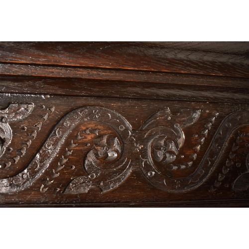 387 - A late 17th century / early 18th century oak court cupboard. The cupboard having a pediment atop wit... 