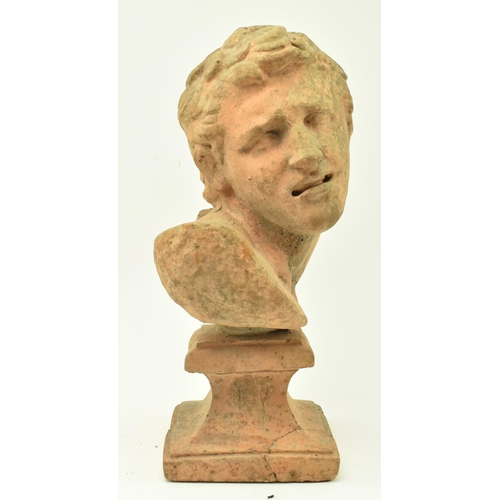 388 - An early 20th century terracotta bust of Classical inspired mythological character, possibly Hercule... 