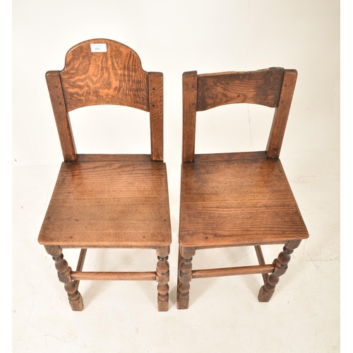 389 - A pair of 19th century oak and elm correctional chairs. Each with panel back and seat rests with eac... 