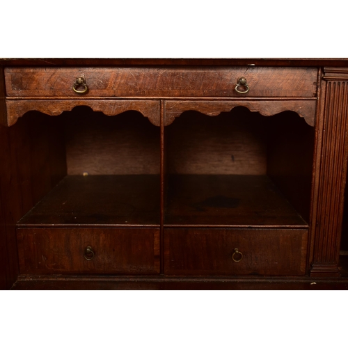 396 - A Queen Anne 18th century burr walnut bureau bookcase or estate cabinet. The cabinet having a scroll... 