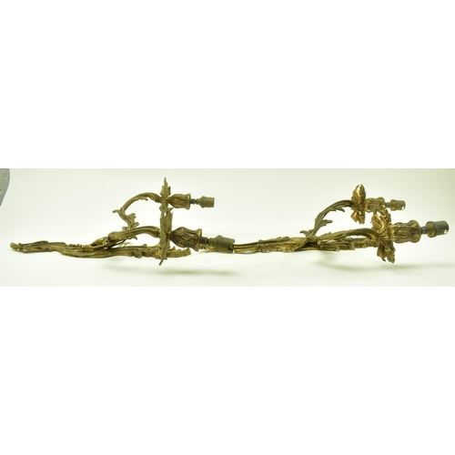 399 - A pair of Rococo style French Louis XV inspired acanthus leaves twin arm wall sconces electroliers. ... 