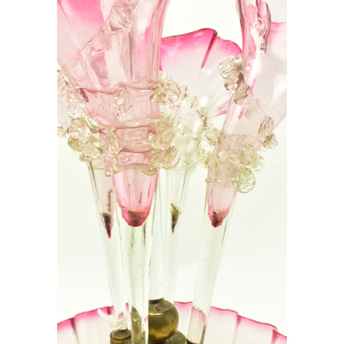 71 - A Victorian 19th century cranberry tinted & clear glass epergne centrepiece. The centrepiece having ... 