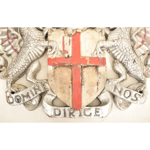 252 - An early 20th century circa 1900 hand painted carved wood City of London crest. The crest with the t... 