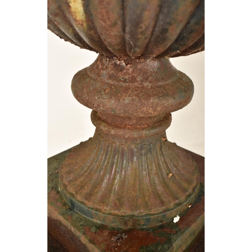 255 - A large 19th century cast iron Campana-shaped garden urn / planter. The campana urn having a gadroon... 