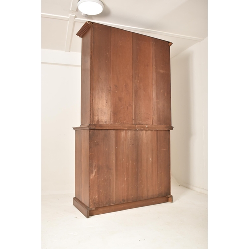 262 - A matching pair of late 19th century Victorian oak bookcase cabinets. Each having led lined glazed d... 