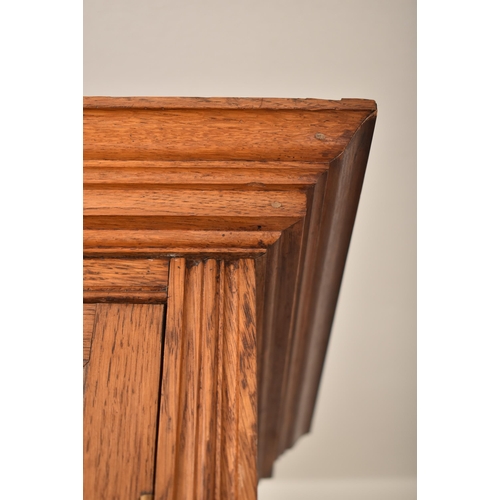 262 - A matching pair of late 19th century Victorian oak bookcase cabinets. Each having led lined glazed d... 