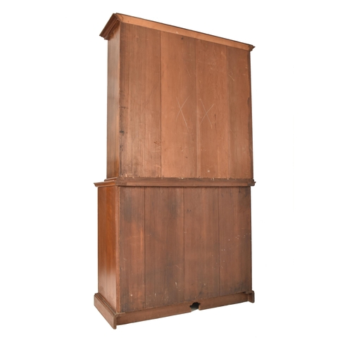 262 - A matching pair of late 19th century Victorian oak bookcase cabinets. Each having led lined glazed d... 